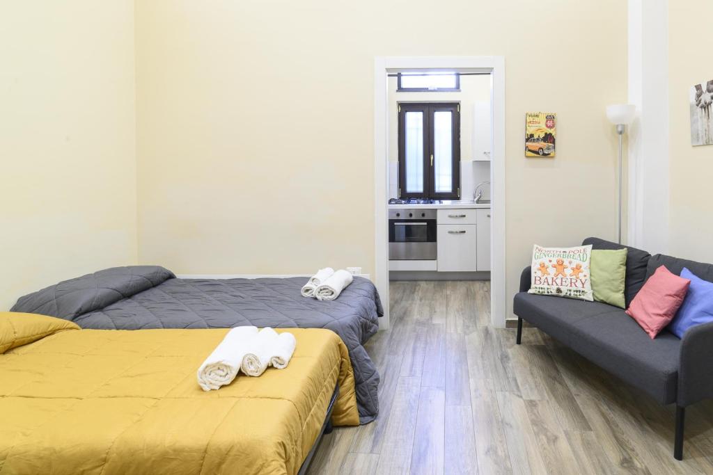 Postel nebo postele na pokoji v ubytování Nonna Concetta B&B Nocera - Vicino Tribunale di Nocera - Ristrutturato 2022