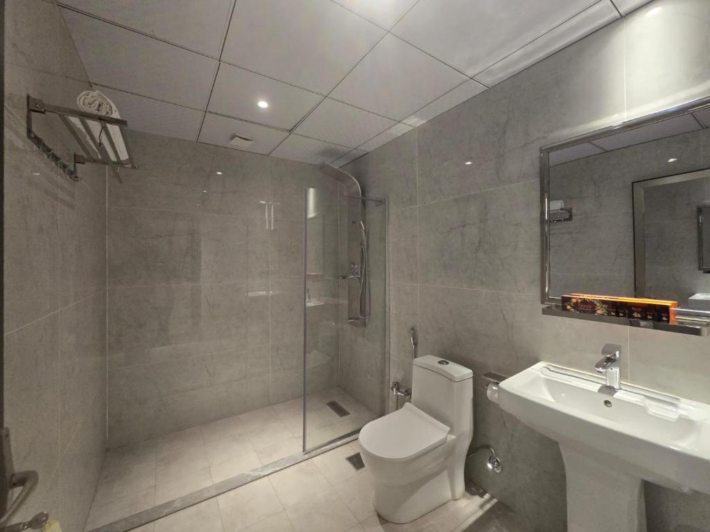 Ένα μπάνιο στο Baghdad Business Hotel - فندق اعمال بغداد