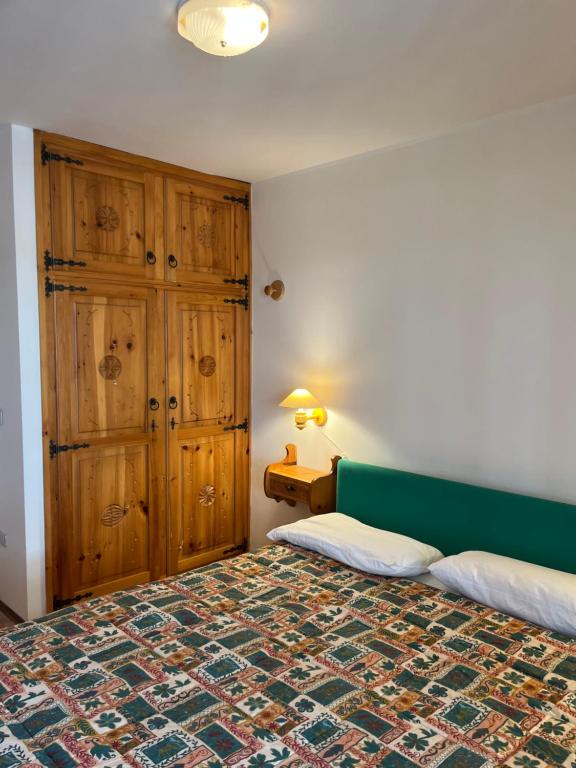 Postel nebo postele na pokoji v ubytování Maison Neve Fiorita