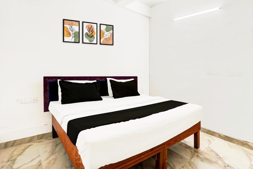 Ένα ή περισσότερα κρεβάτια σε δωμάτιο στο Collection O Ak Hotels