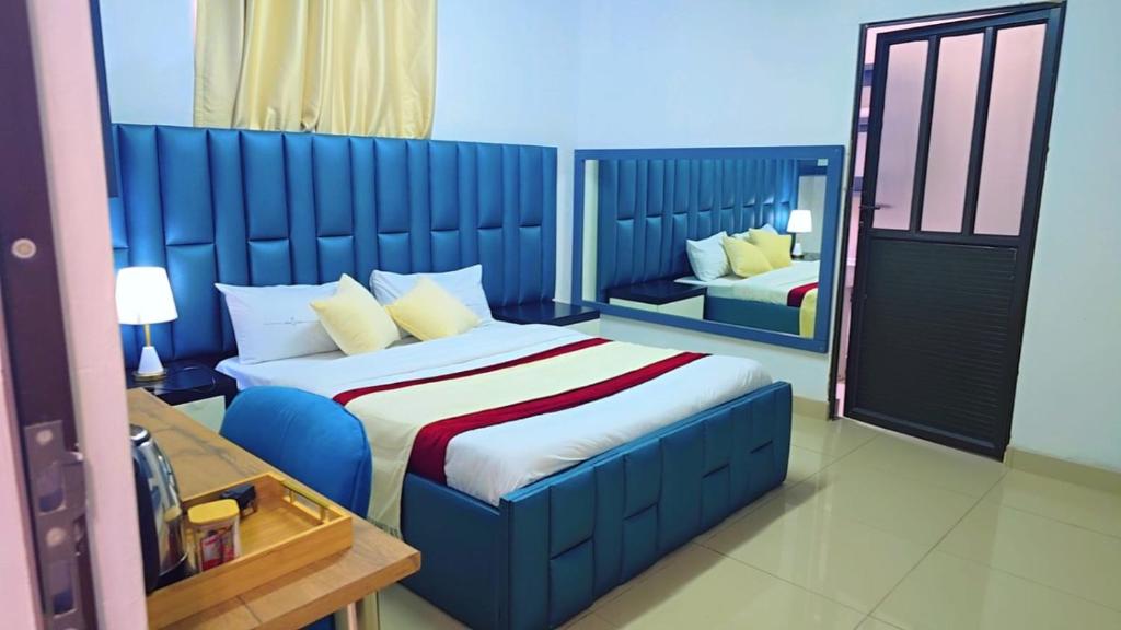 Postel nebo postele na pokoji v ubytování Jabulani Lodge