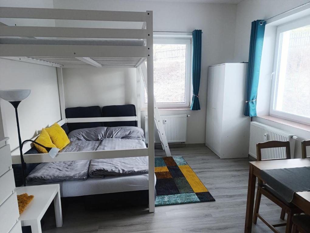 Giường trong phòng chung tại Apartmán Denisa