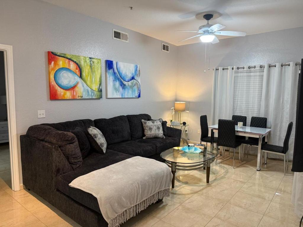 a living room with a couch and a table at Luxury house in Disney in Kissimmee