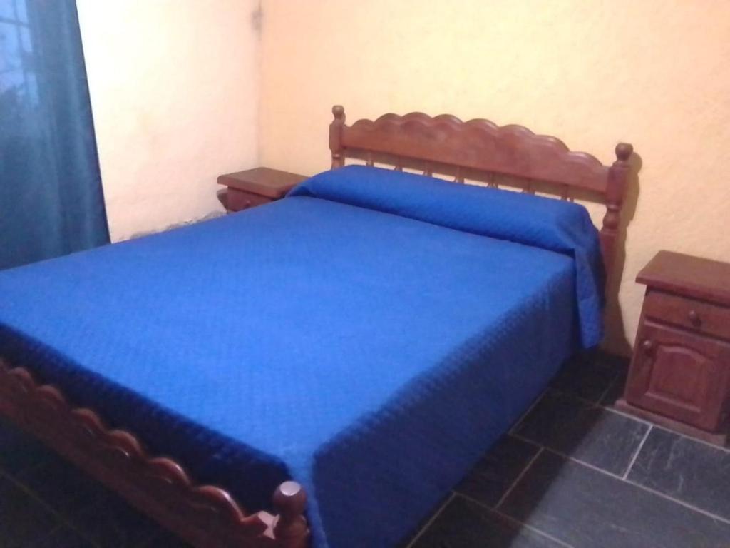 Postel nebo postele na pokoji v ubytování Cabañas Ojo de Agua