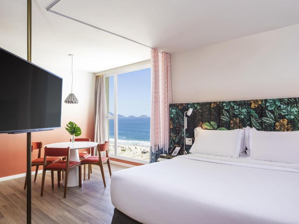 Postel nebo postele na pokoji v ubytování Mercure Rio Boutique Hotel Copacabana