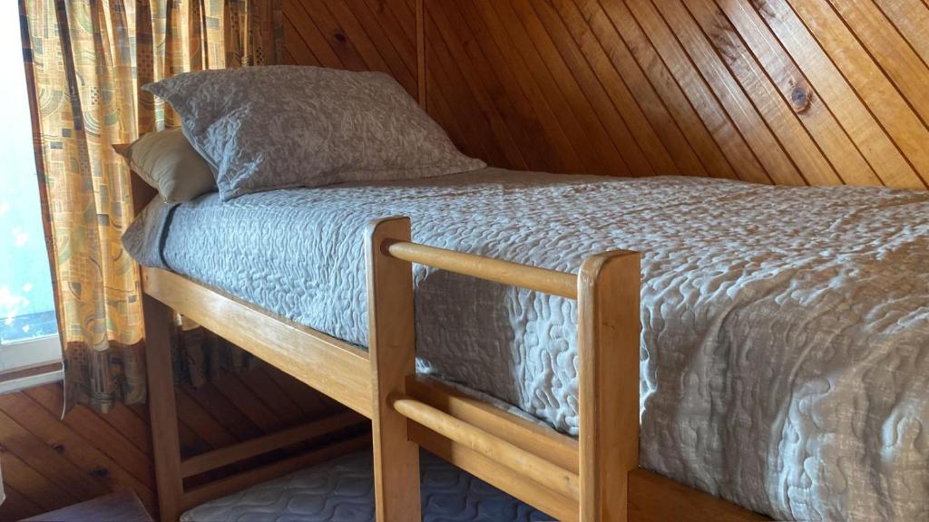 Ένα ή περισσότερα κρεβάτια σε δωμάτιο στο LicanRay