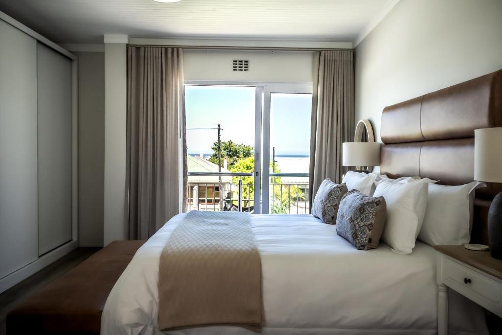 En eller flere senge i et værelse på Tide & Together