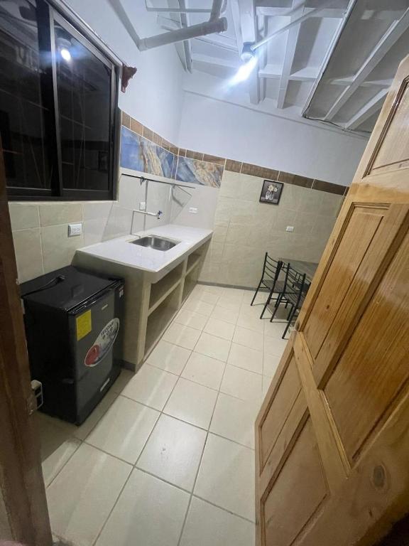 Una cocina o cocineta en Apartamento Bermudez