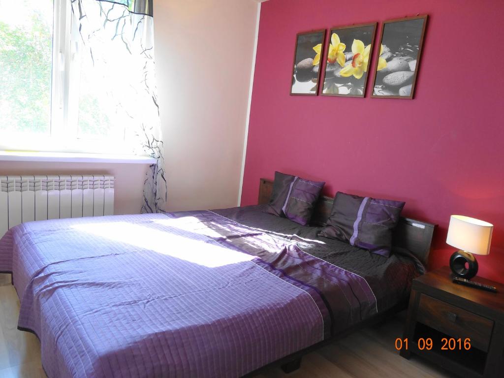 Posteľ alebo postele v izbe v ubytovaní Apartament Kryształowy