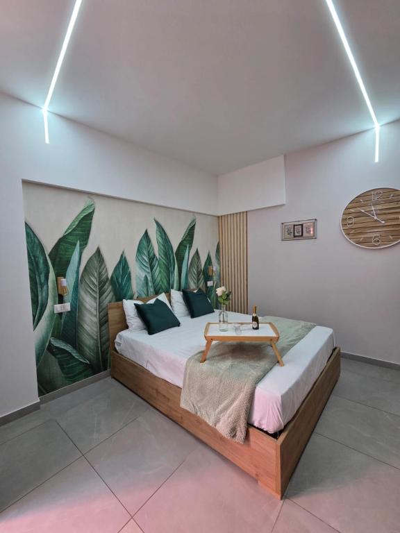 a bedroom with a bed with a table on it at Sams Room in Catania
