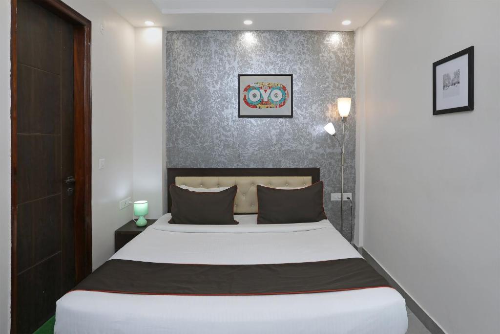 Кровать или кровати в номере Super Hotel O The Signature Inn