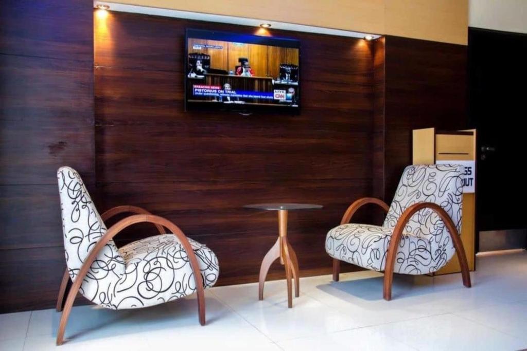 Телевизор и/или развлекательный центр в Li Tour International Hotel