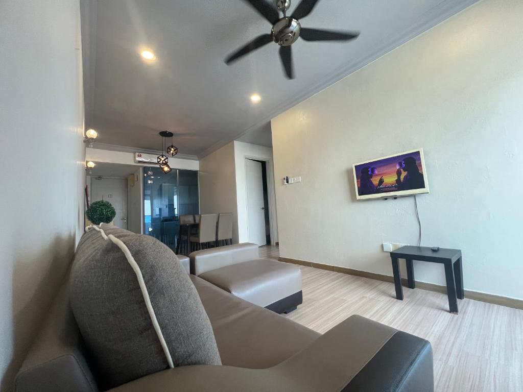 Et tv og/eller underholdning på Comfy Home at The Wave Residence