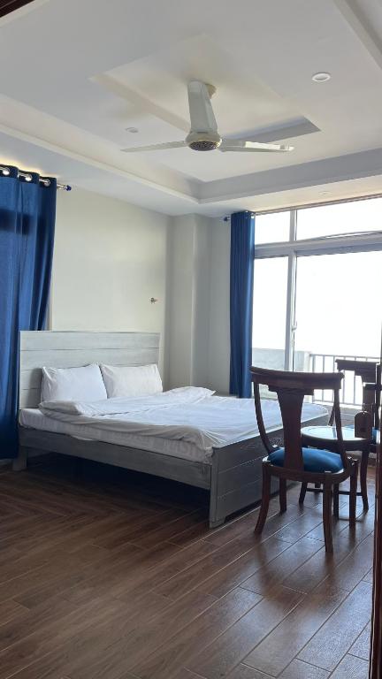 Ένα ή περισσότερα κρεβάτια σε δωμάτιο στο Hills view hotel and restaurant