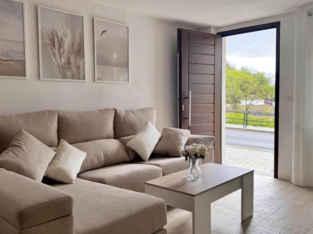 a living room with a couch and a table at Albaicin Rolando FreshApartment in Granada