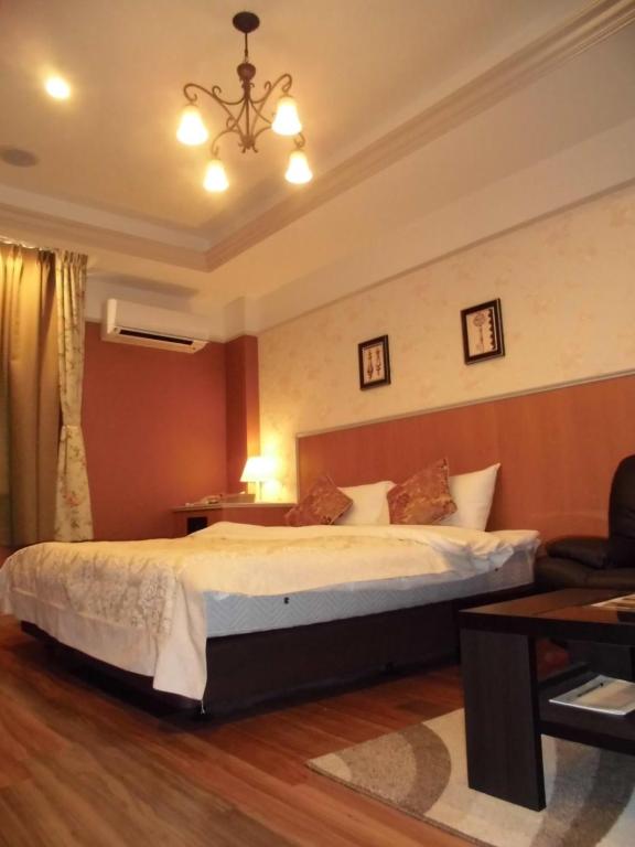 Postel nebo postele na pokoji v ubytování Hotel D.D