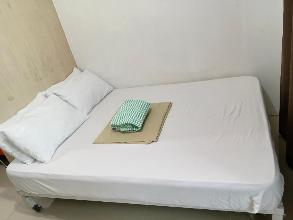 Postel nebo postele na pokoji v ubytování Rosaland staycation