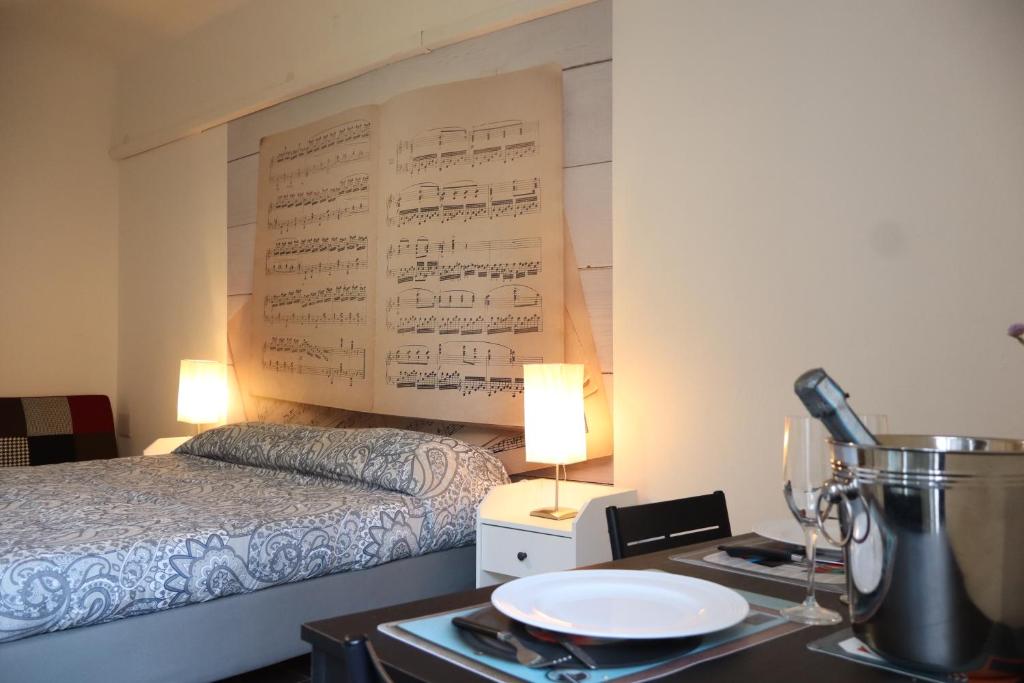 Een bed of bedden in een kamer bij BELLA PRIMO PIANO