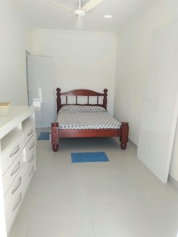 En eller flere senge i et værelse på Suíte jambo