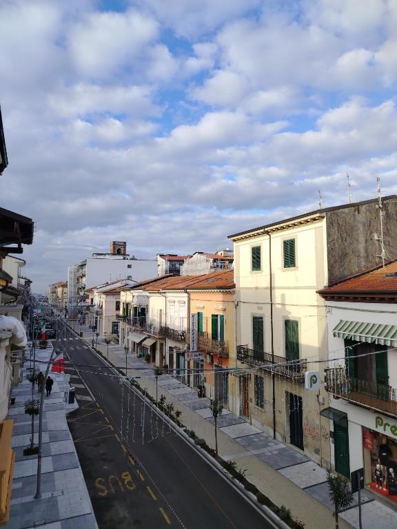 a view of a city street with buildings at Mazzini Affittacamere in Viareggio