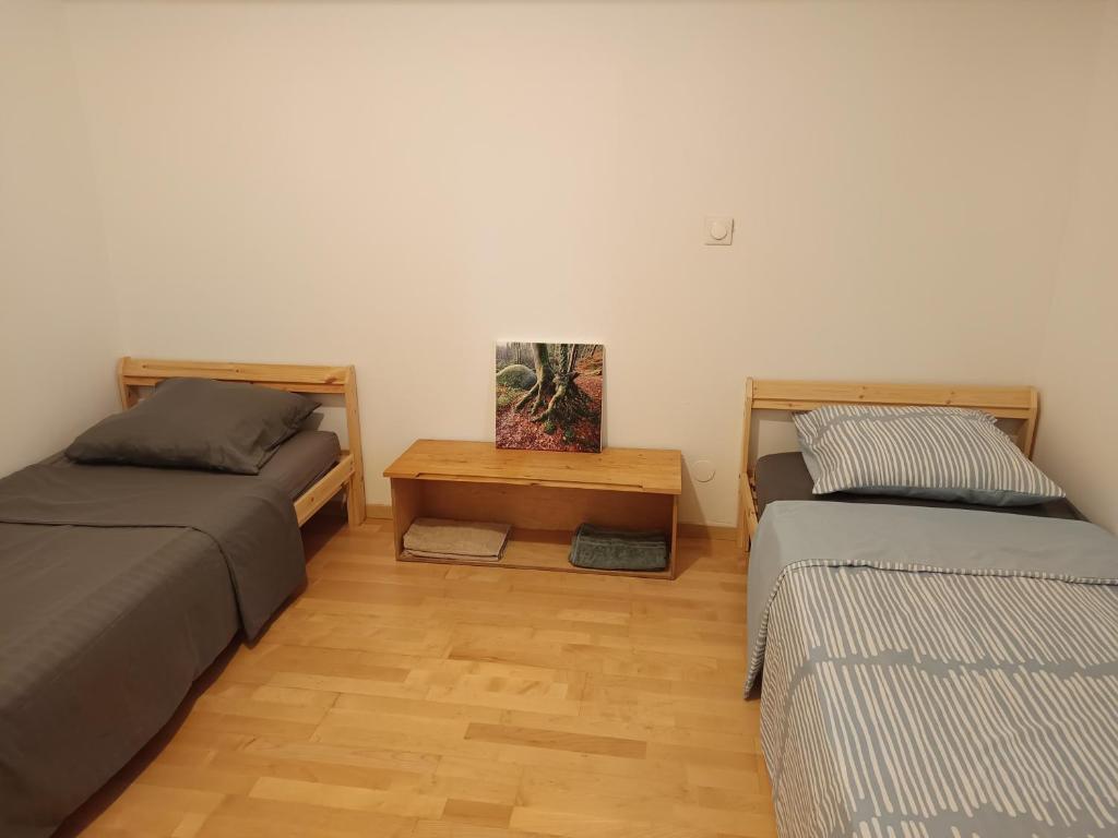 Postel nebo postele na pokoji v ubytování Maisonnette proche de Strasbourg