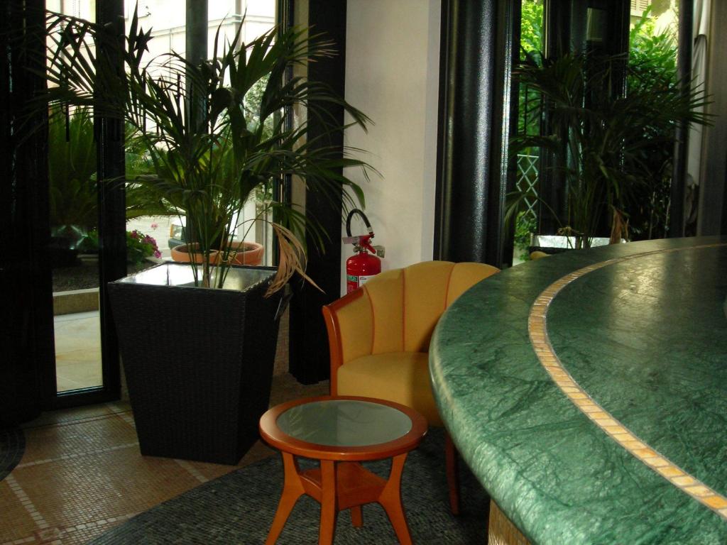 Posezení v ubytování La Perla B&B Hotel