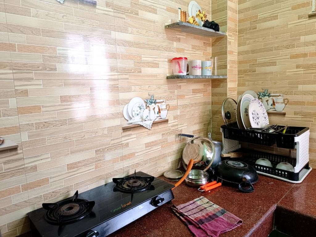 Kuchyň nebo kuchyňský kout v ubytování Patliputra Vihar