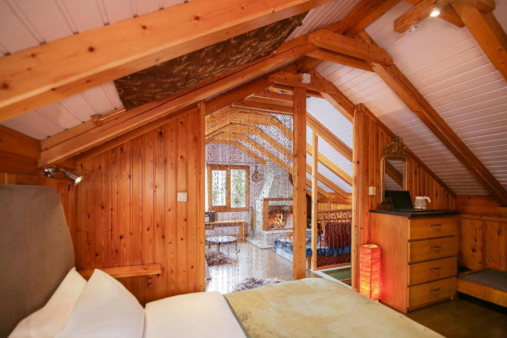 Ένα ή περισσότερα κρεβάτια σε δωμάτιο στο Mylonas Guesthouse