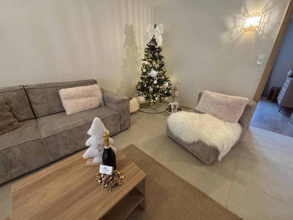 Χώρος καθιστικού στο Appartement La Vieille Maison Le joyau rénové