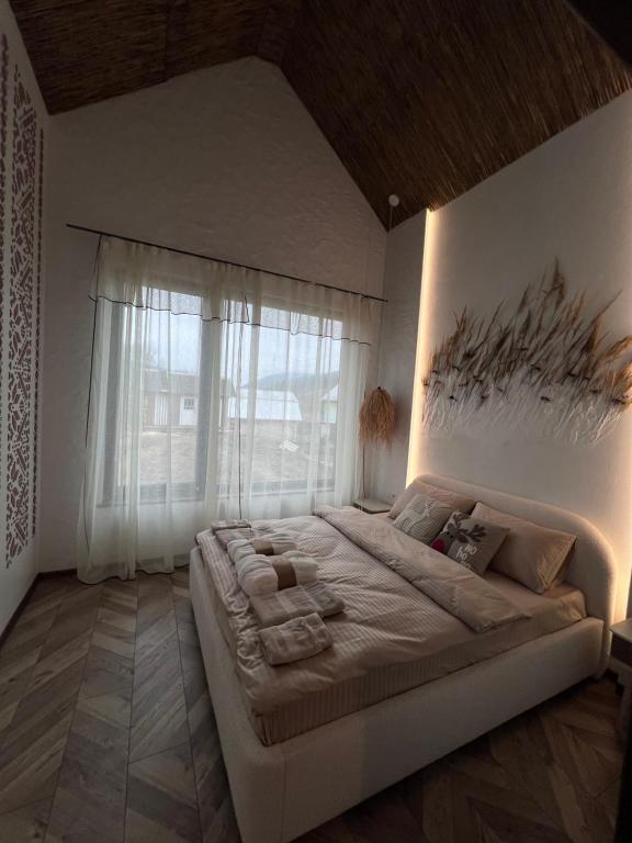 Postel nebo postele na pokoji v ubytování Villa Pelahia