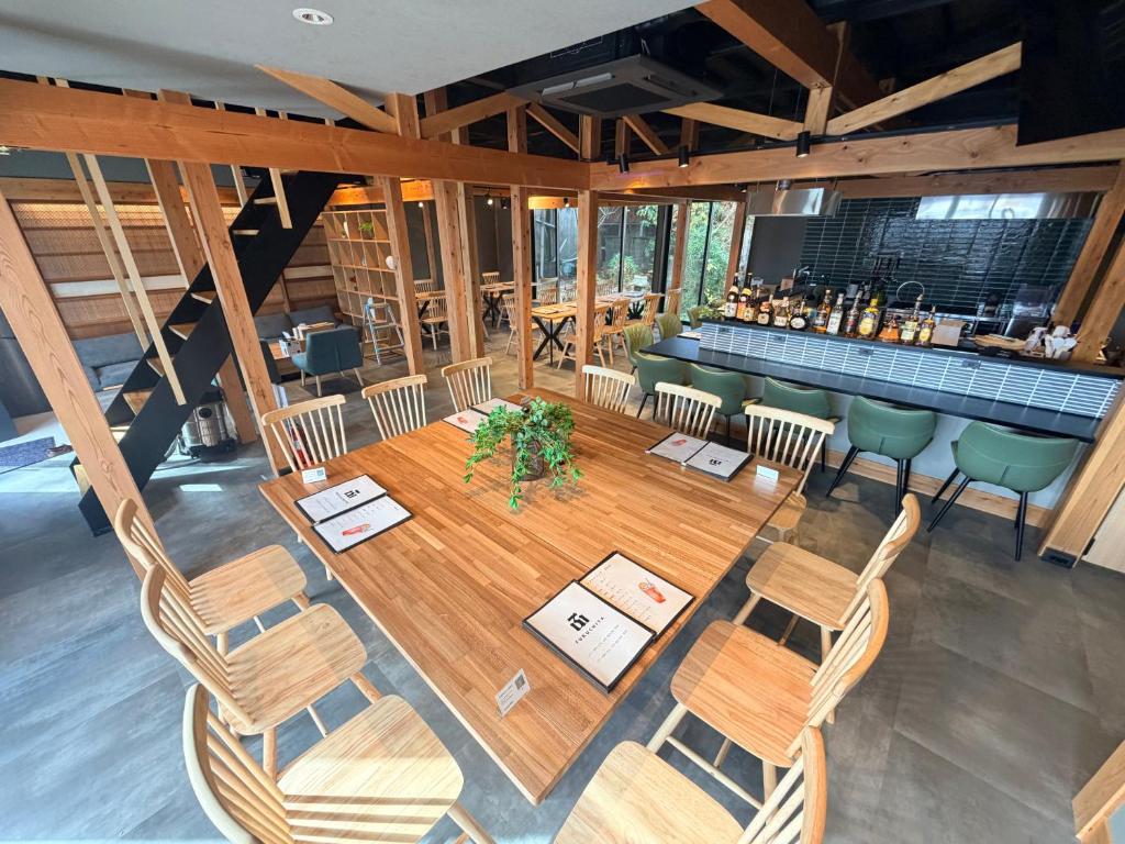 an overhead view of a restaurant with chairs and a bar at Fukuchiya in Fujiyoshida