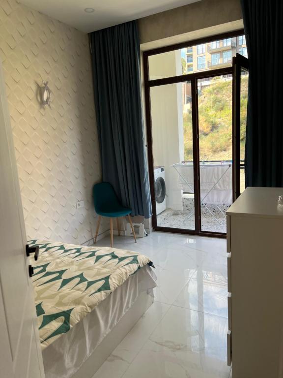 Un pat sau paturi într-o cameră la Apartment for rent