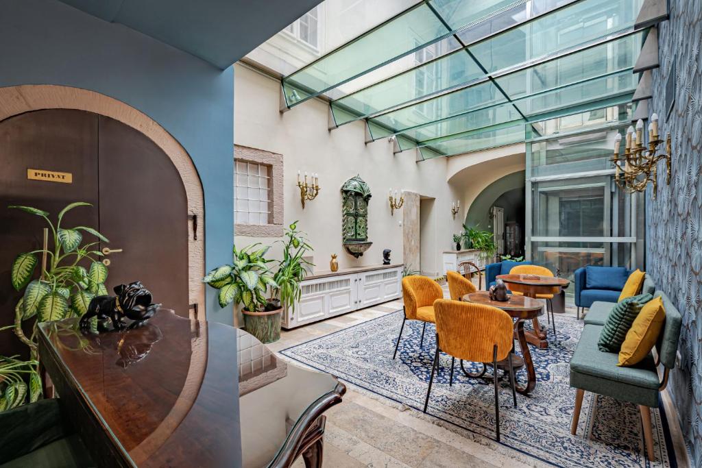 a living room with a glass ceiling at Giselle Buda Castle in Budapest