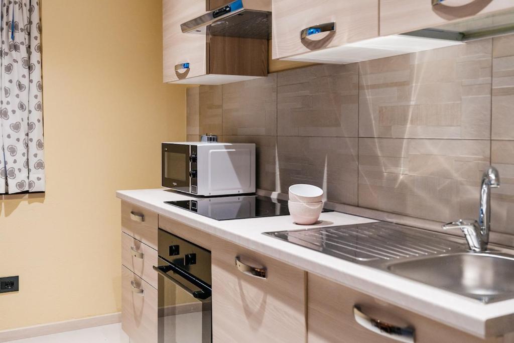 Kuchyň nebo kuchyňský kout v ubytování Chez Mario - 2 bedroom - Parking