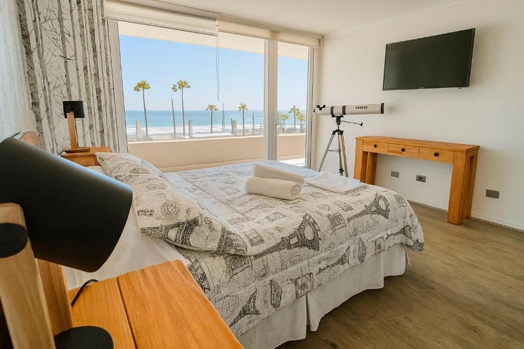 En eller flere senge i et værelse på AQUA – Mar, Espacio, Vista y Comodidades Premium