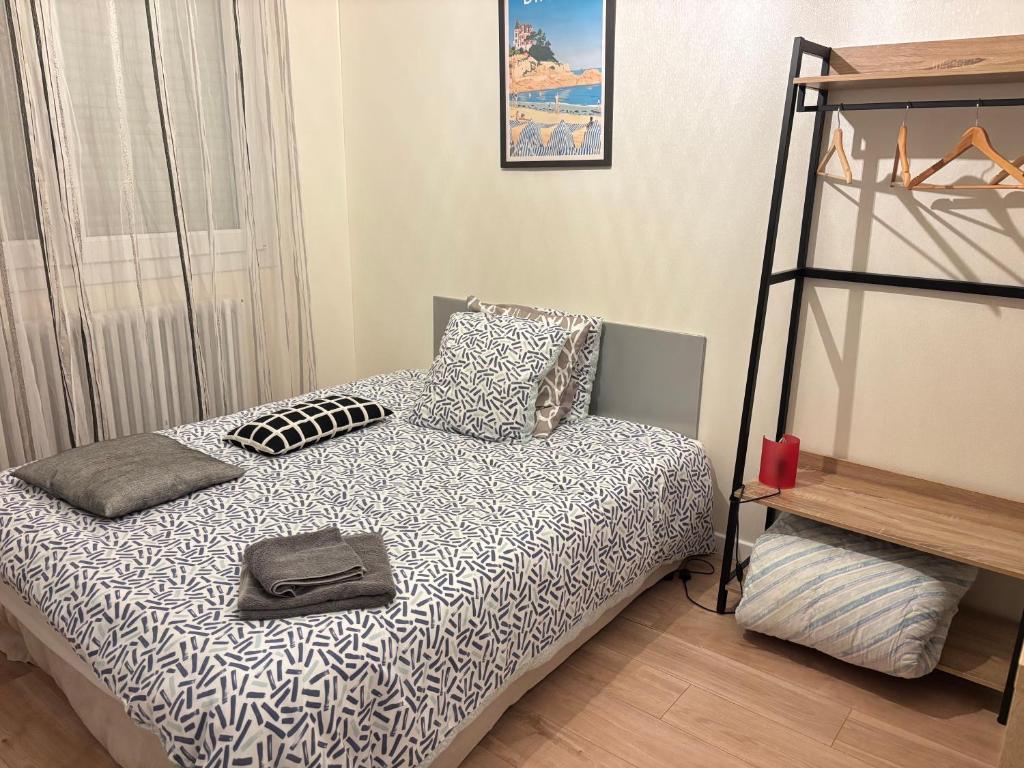 Ένα ή περισσότερα κρεβάτια σε δωμάτιο στο La Maison du Bonheur