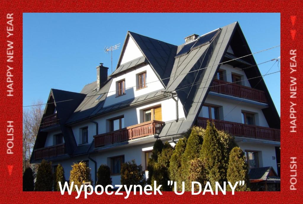 a house with a solar roof on top of it at U Dany in Białka Tatrzanska