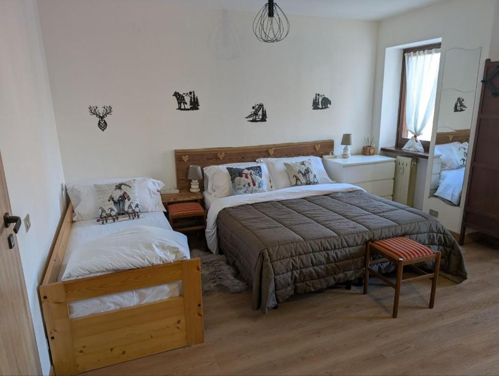 En eller flere senge i et værelse på Natalia