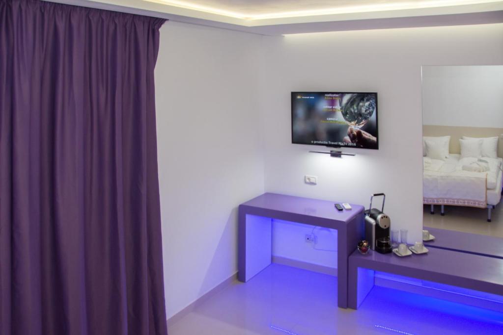 Postel nebo postele na pokoji v ubytování Hotel Christina Plus