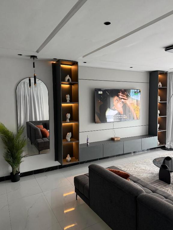 TV a/nebo společenská místnost v ubytování Sweet Home Escape
