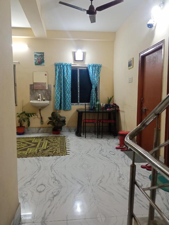 a view of a room with a sink and a bathroom at Ghosh homestay 8 in kolkata