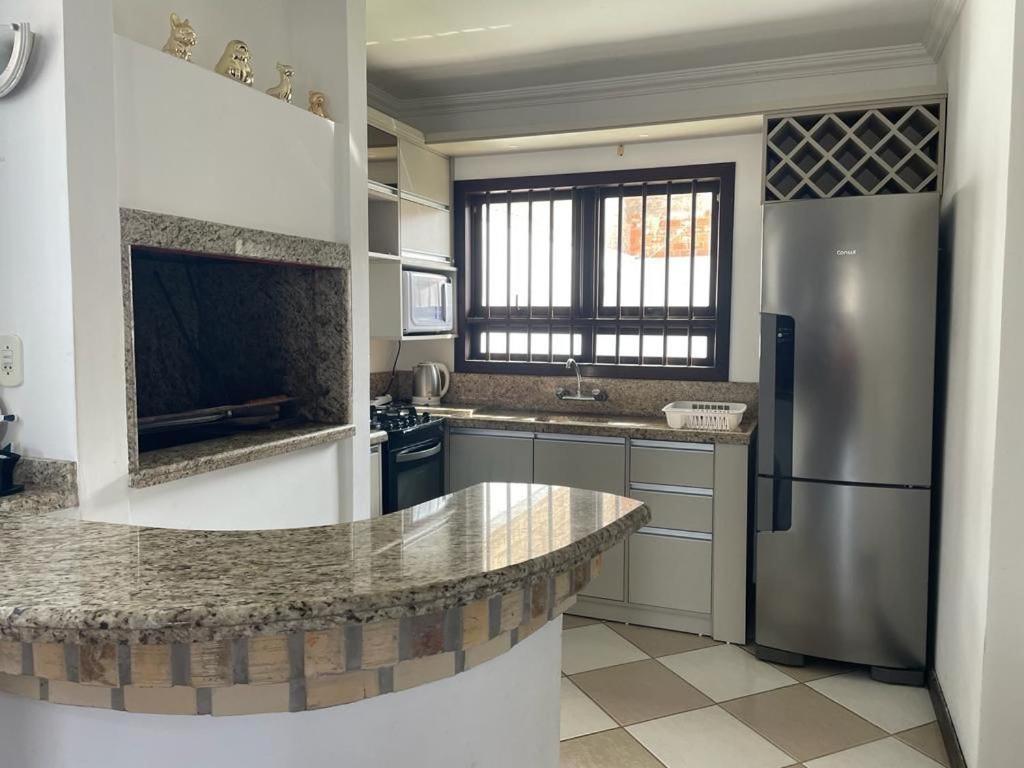 Kuchyň nebo kuchyňský kout v ubytování Sobrado em Imbé - RS