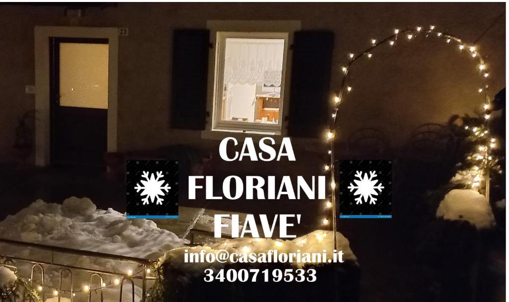 een bord met de tekst "Casa Floriana Have" voor een huis bij Casa Floriani Fiavè-Comano Terme green in Fiavè