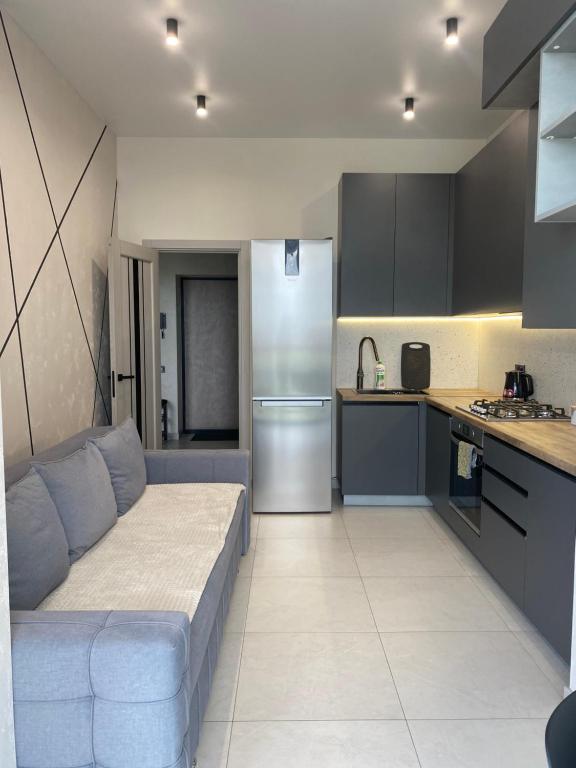 Kuchyň nebo kuchyňský kout v ubytování VIP Апартаменти Центр ЖК Яровиця Паркомісце