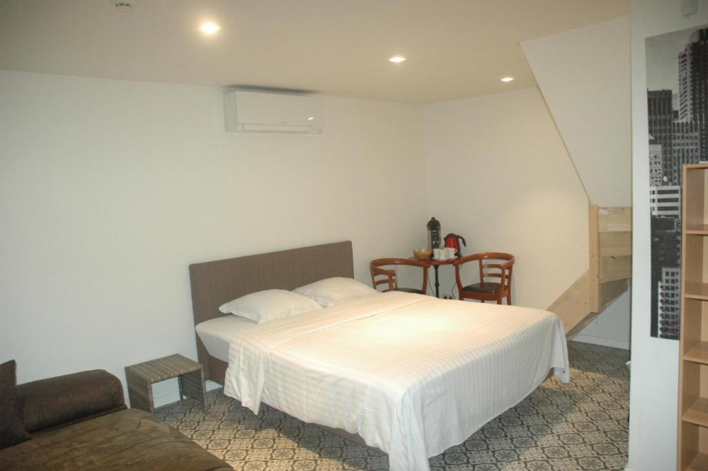 Postel nebo postele na pokoji v ubytování Prediker