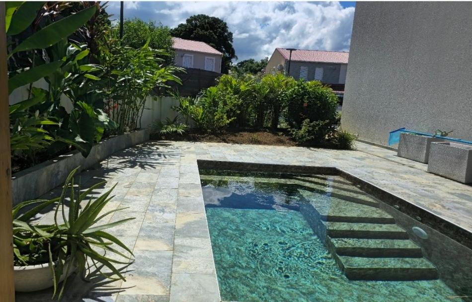 Swimmingpoolen hos eller tæt på Palm'Ô Zen