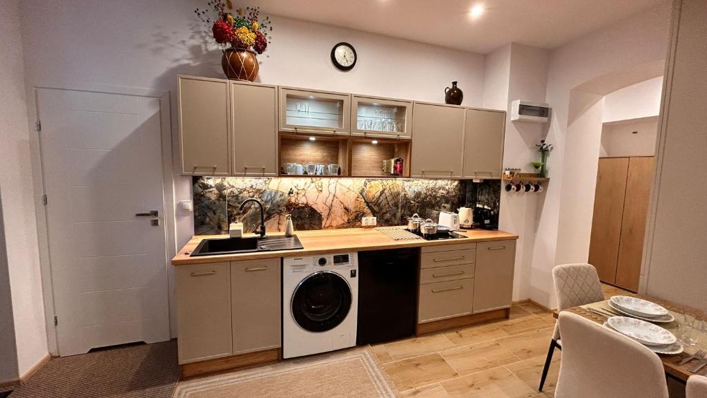 Køkken eller tekøkken på Miodowy apartament