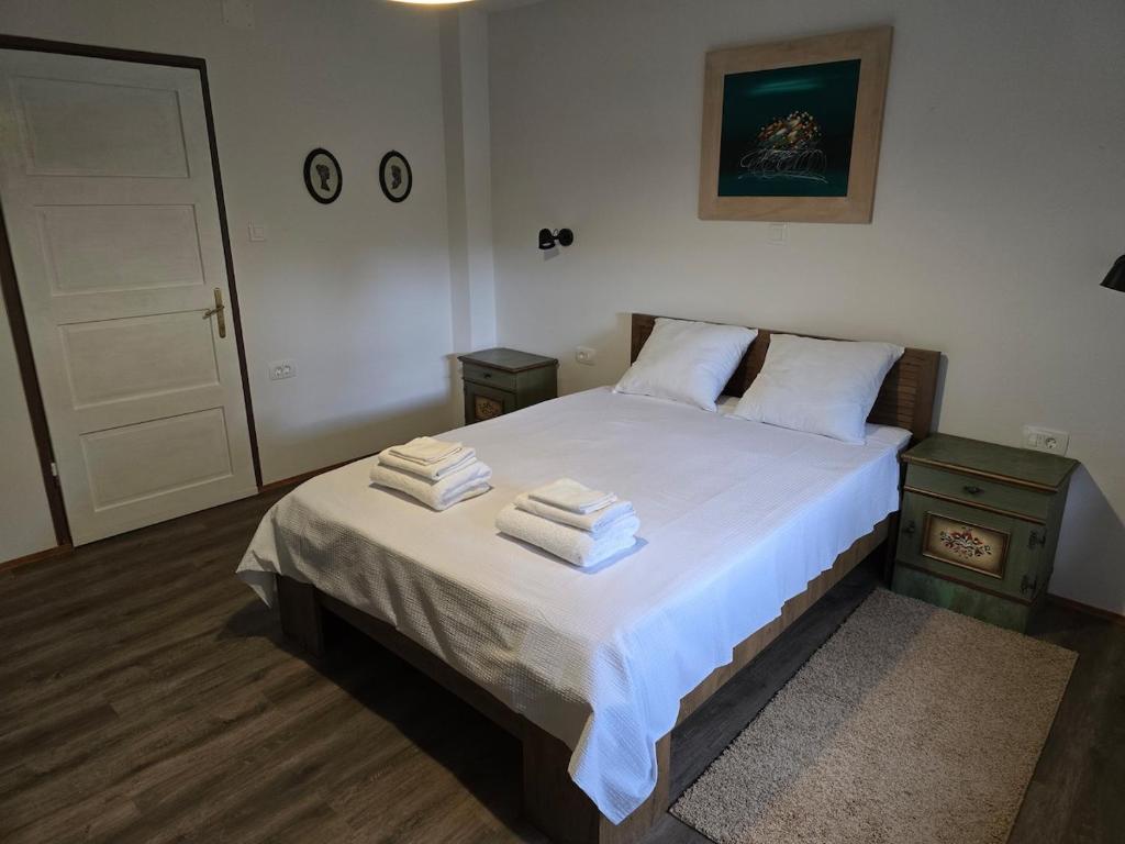 Ένα ή περισσότερα κρεβάτια σε δωμάτιο στο Kod bake