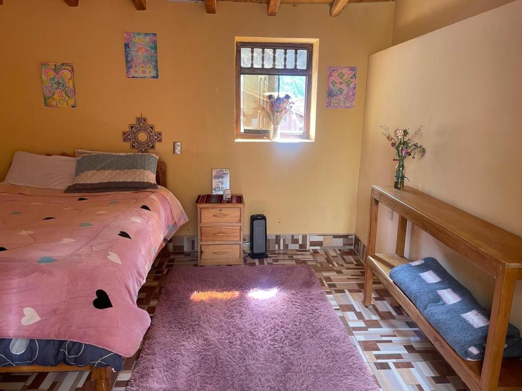 Ένα ή περισσότερα κρεβάτια σε δωμάτιο στο Casa merkaba