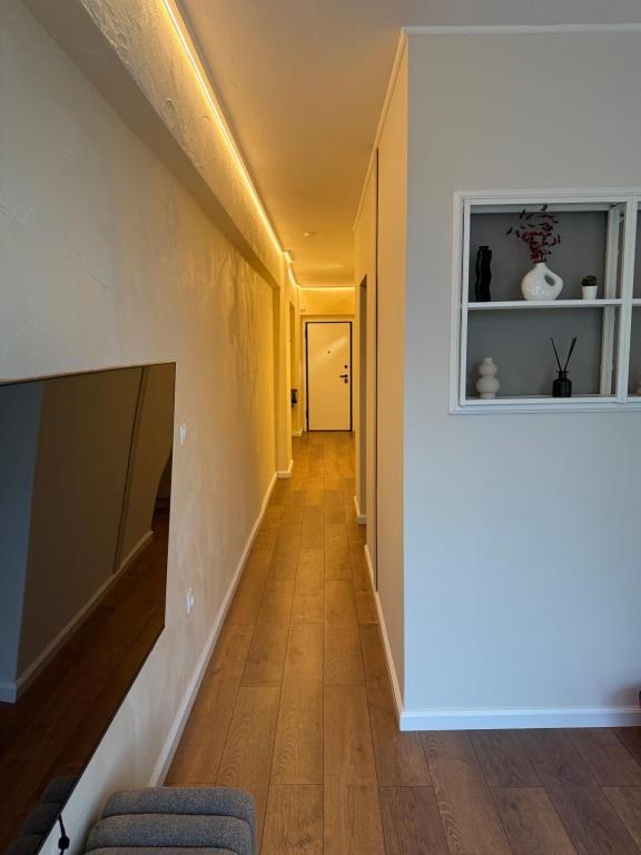 Телевизор и/или развлекательный центр в BK Urban Living